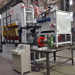 Vanerin kuumapuristuskone